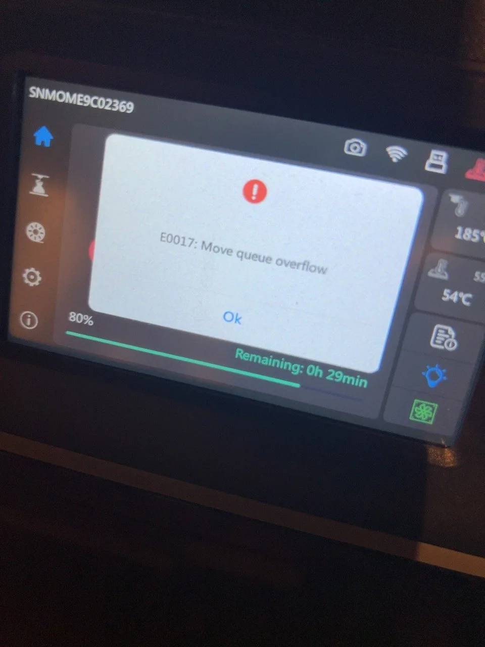 The printer display showing E0017: Move queue overflow, with progress at 80 percent.